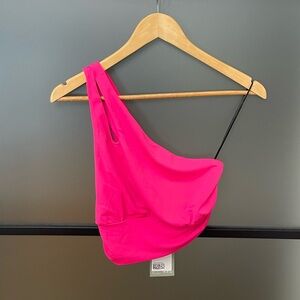 One shoulder hot pink H&M cropped tank with cutouts on front and back